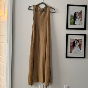 Long sleeveless sweater. Size small. Tan colour.